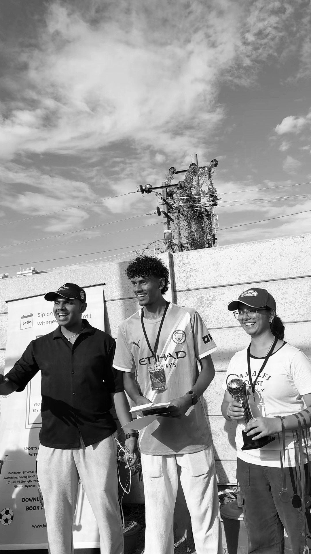 Organisers on the podium with the Elysium Cup trophy