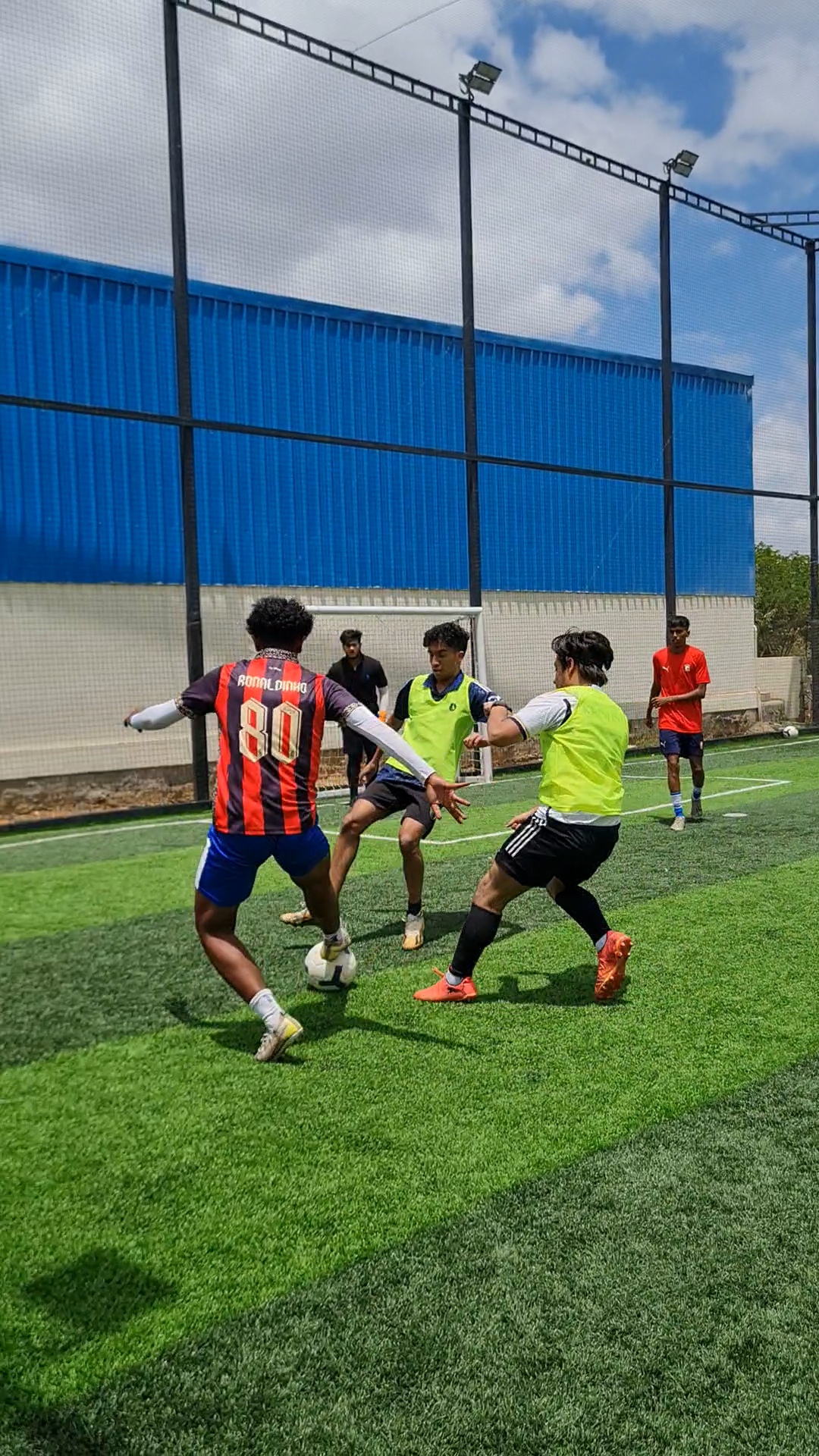 Midfield duel during a group-stage match